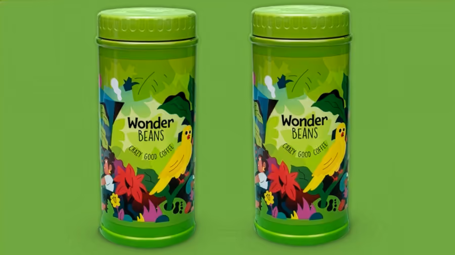 Twee groene koffieblikken van Wonder Beans met een illustratie van een jungle en een gele vogel
